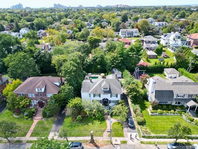 an aerial view of a house with a garden