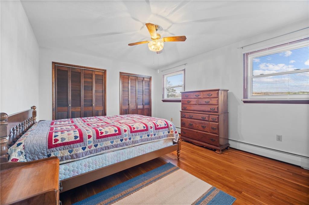 905 Watt Road Apollo, PA 15613 - Photo 16 of 30 a bedroom with a bed and wooden floor