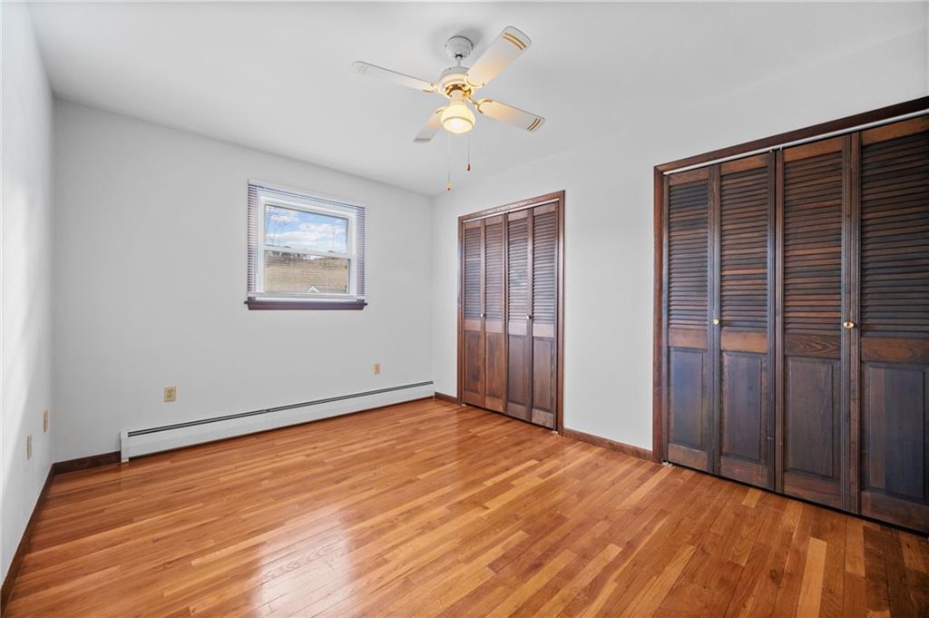 905 Watt Road Apollo, PA 15613 - Photo 17 of 30 a view of an empty room with wooden floor