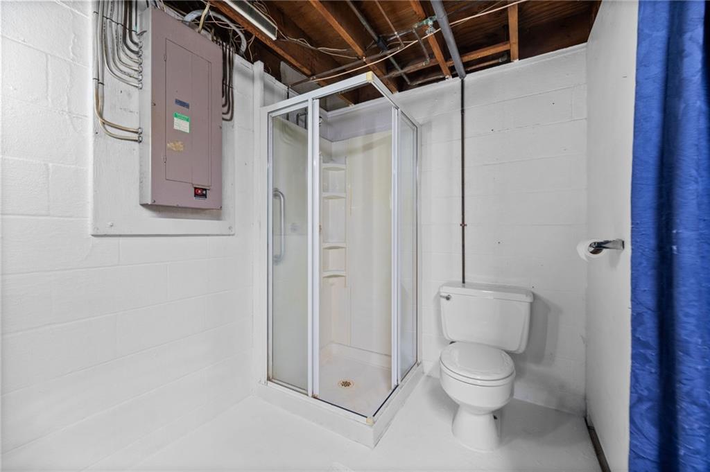 905 Watt Road Apollo, PA 15613 - Photo 21 of 30 a bathroom with a toilet and shower