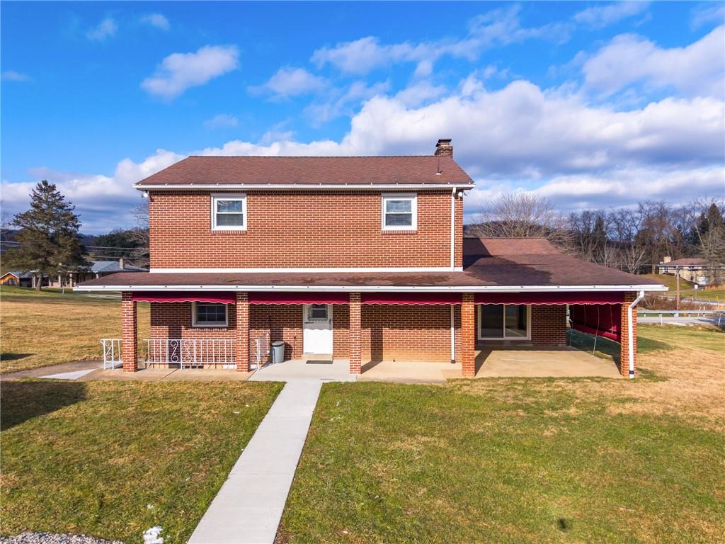 905 Watt Road Apollo, PA 15613 - Photo 26 of 30 front view of a house with a swimming pool