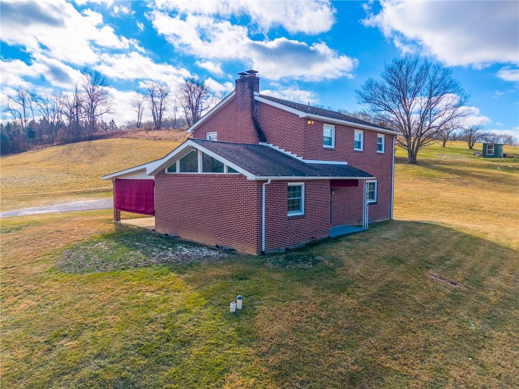 905 Watt Road Apollo, PA 15613 - Photo 27 of 30 a view of a yard with red house