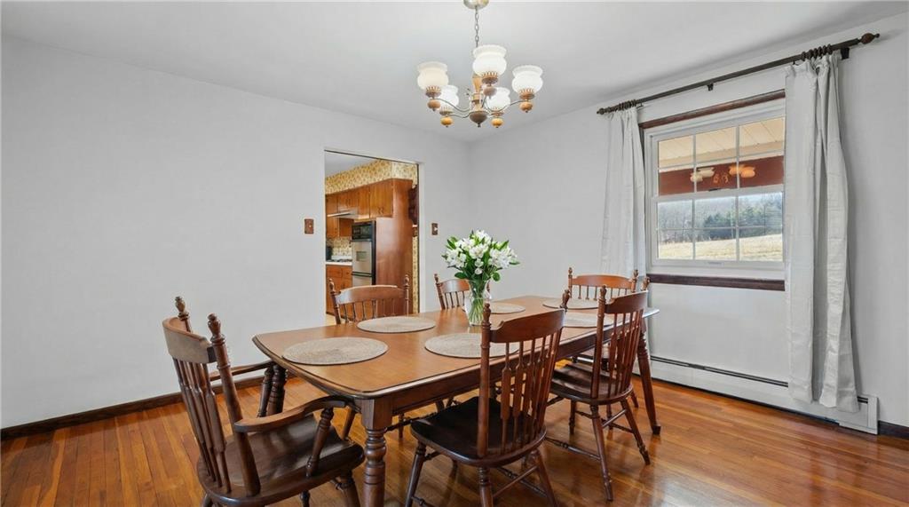 905 Watt Road Apollo, PA 15613 - Photo 8 of 30 a view of a dining room with furniture and wooden floor