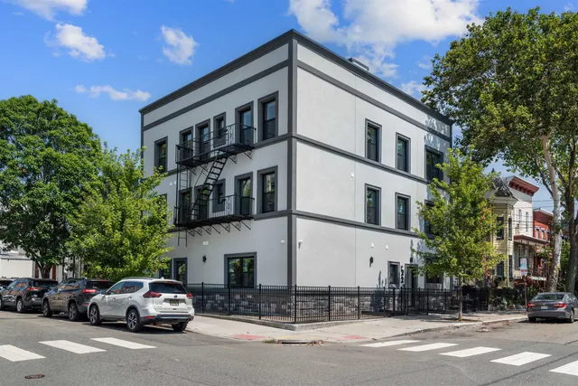 a car parked in front of a building