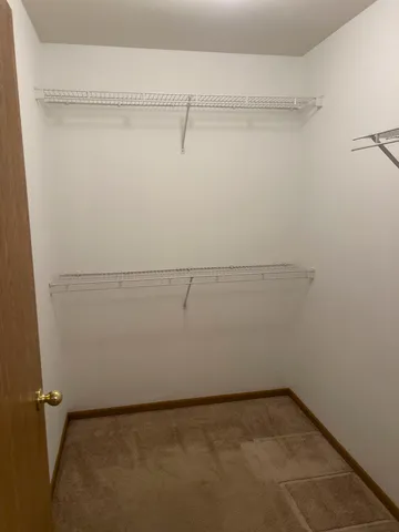 a view of a room with racks on the wall