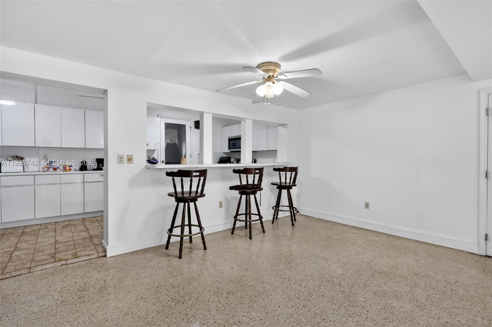 733 West 33rd Street Hialeah, FL 33012 - Photo 26 of 45 a view of a kitchen and kitchen with microwave