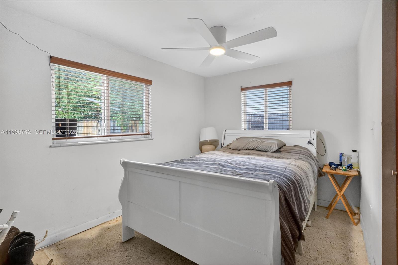 733 West 33rd Street Hialeah, FL 33012 - Photo 29 of 45 a bedroom with a bed and a window