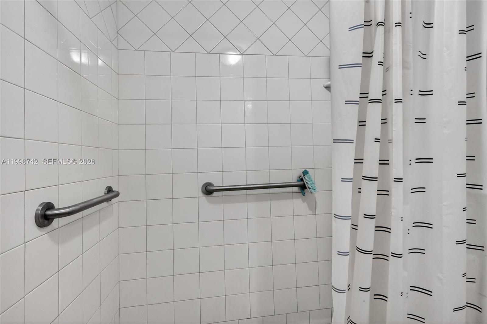 733 West 33rd Street Hialeah, FL 33012 - Photo 36 of 45 a bathroom with a shower