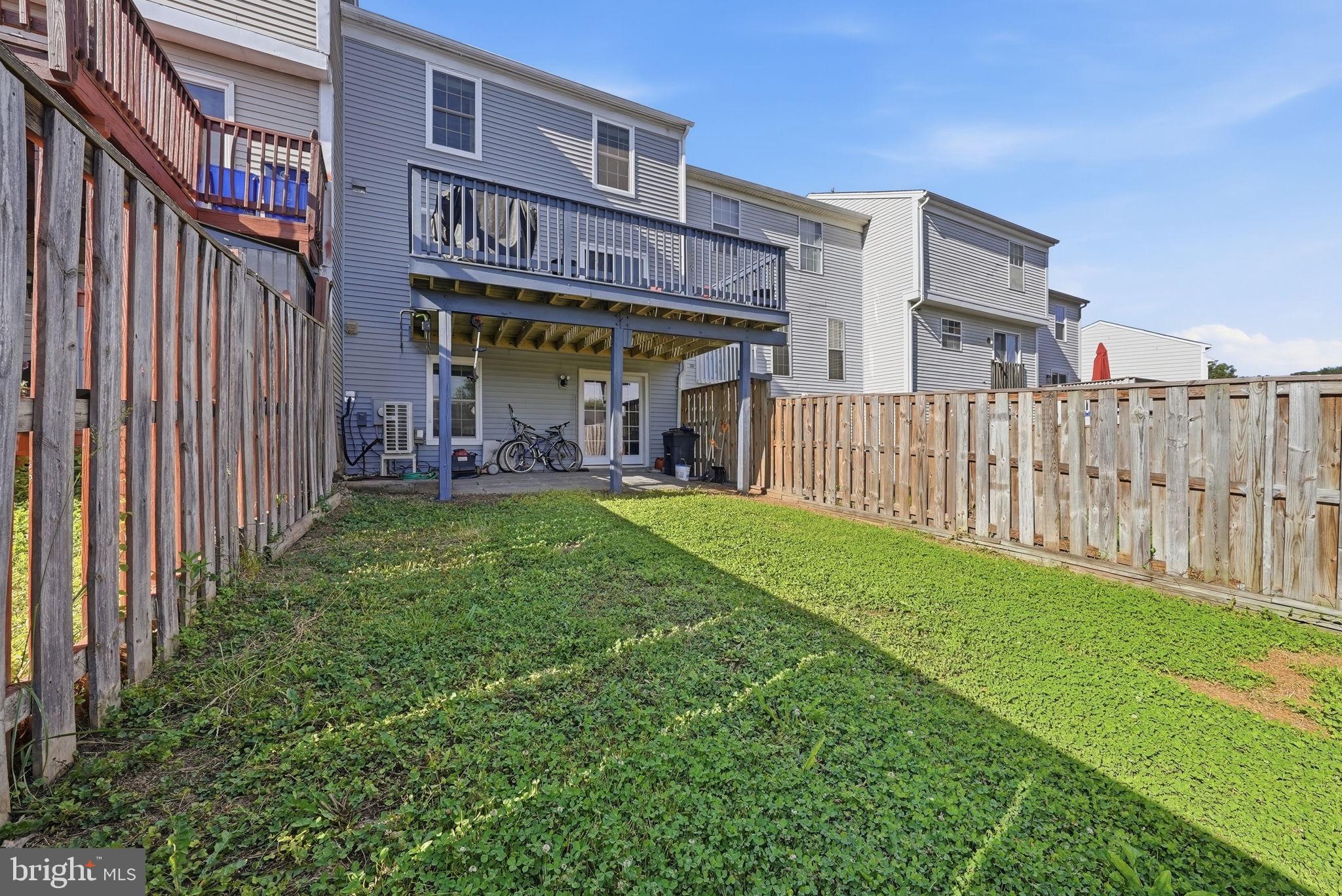 9236 Labelle Lane Gaithersburg, MD 20879 - Photo 29 of 33 Spacious backyard with cozy deck.