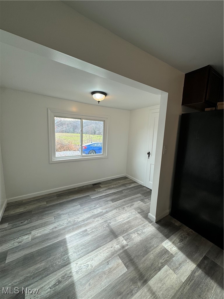 5155 Center Road Philo, OH 43771 - Photo 16 of 37 Unfurnished room featuring light hardwood / wood-style flooring