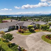 an aerial view of a house and outdoor space