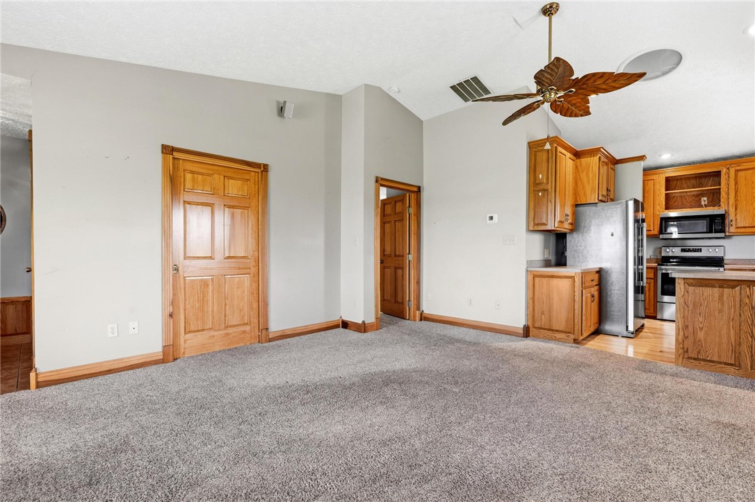 4971 Lackey Road Cedarville, OH 45314 - Photo 50 of 79 This inviting space offers a comfortable layout with warm wood accents throughout.