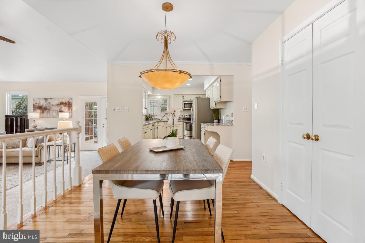 10 Leatherleaf Court Gaithersburg, MD 20878 - Photo 16 of 47 a view of a dining room with furniture window and wooden floor