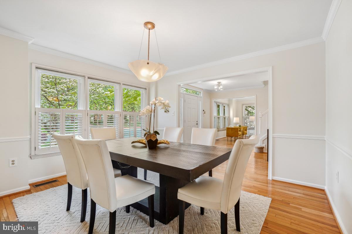 10 Leatherleaf Court Gaithersburg, MD 20878 - Photo 6 of 47 a view of a dining room with furniture wooden floor and chandelier