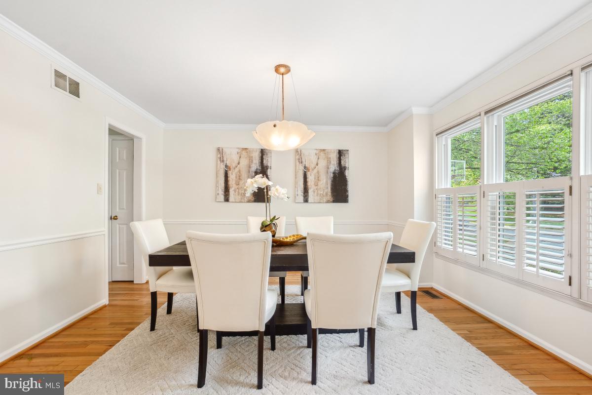 10 Leatherleaf Court Gaithersburg, MD 20878 - Photo 7 of 47 a view of a dining room with furniture window and outside view