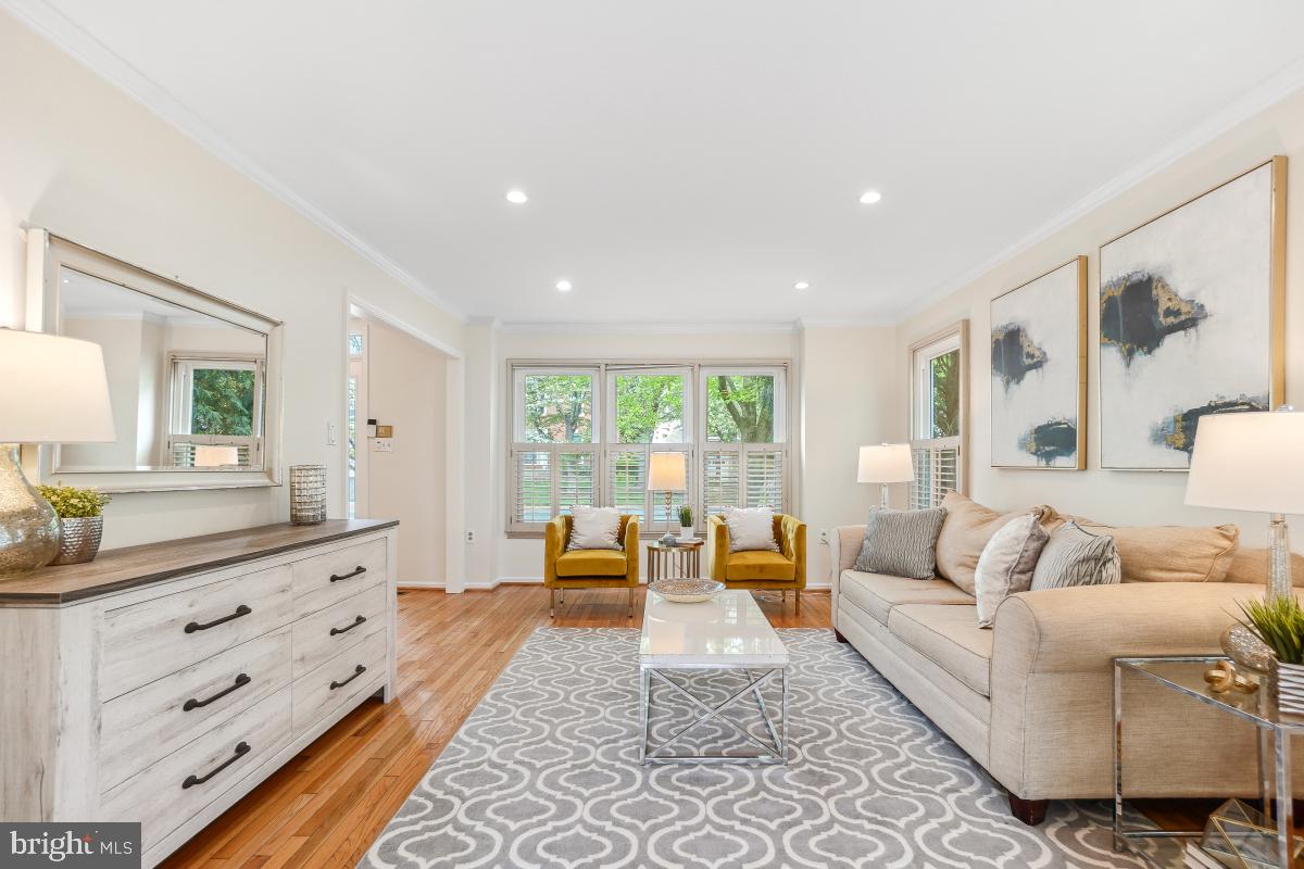 10 Leatherleaf Court Gaithersburg, MD 20878 - Photo 10 of 47 a large bedroom with a large bed and a couch