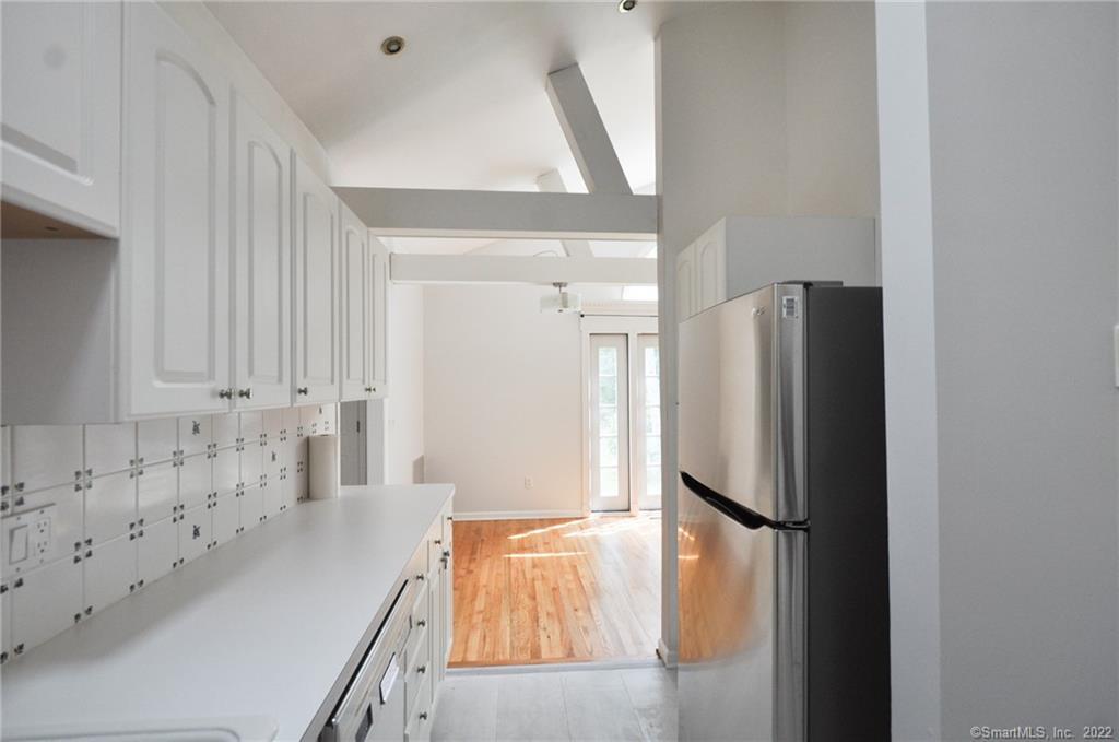 1500 Redding Road Fairfield, CT 06824 - Photo 12 of 22 View from kitchen to the dining area.