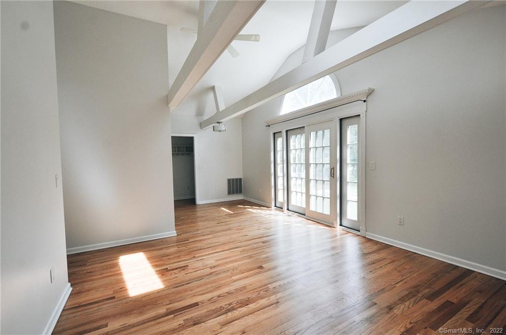 1500 Redding Road Fairfield, CT 06824 - Photo 14 of 22 Open concept living/dining space.(sliding French door does not open)