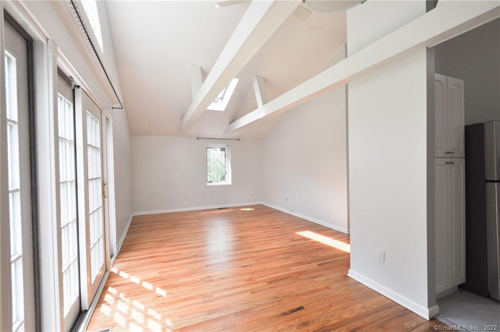 1500 Redding Road Fairfield, CT 06824 - Photo 7 of 22 View from the entry in to the open concept living/dining area. Kitchen is to the right.