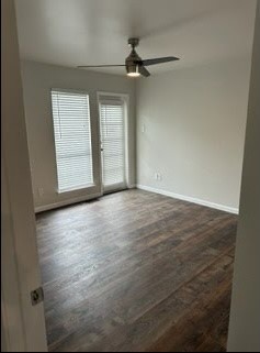 4520 Speedway, Unit A Austin, TX 78751 - Photo 6 of 6 Rich wood-look flooring and abundant natural light define this versatile living space.