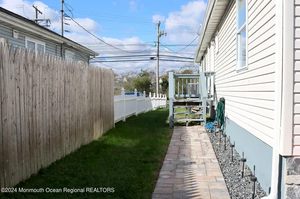 a view of a back yard of the house