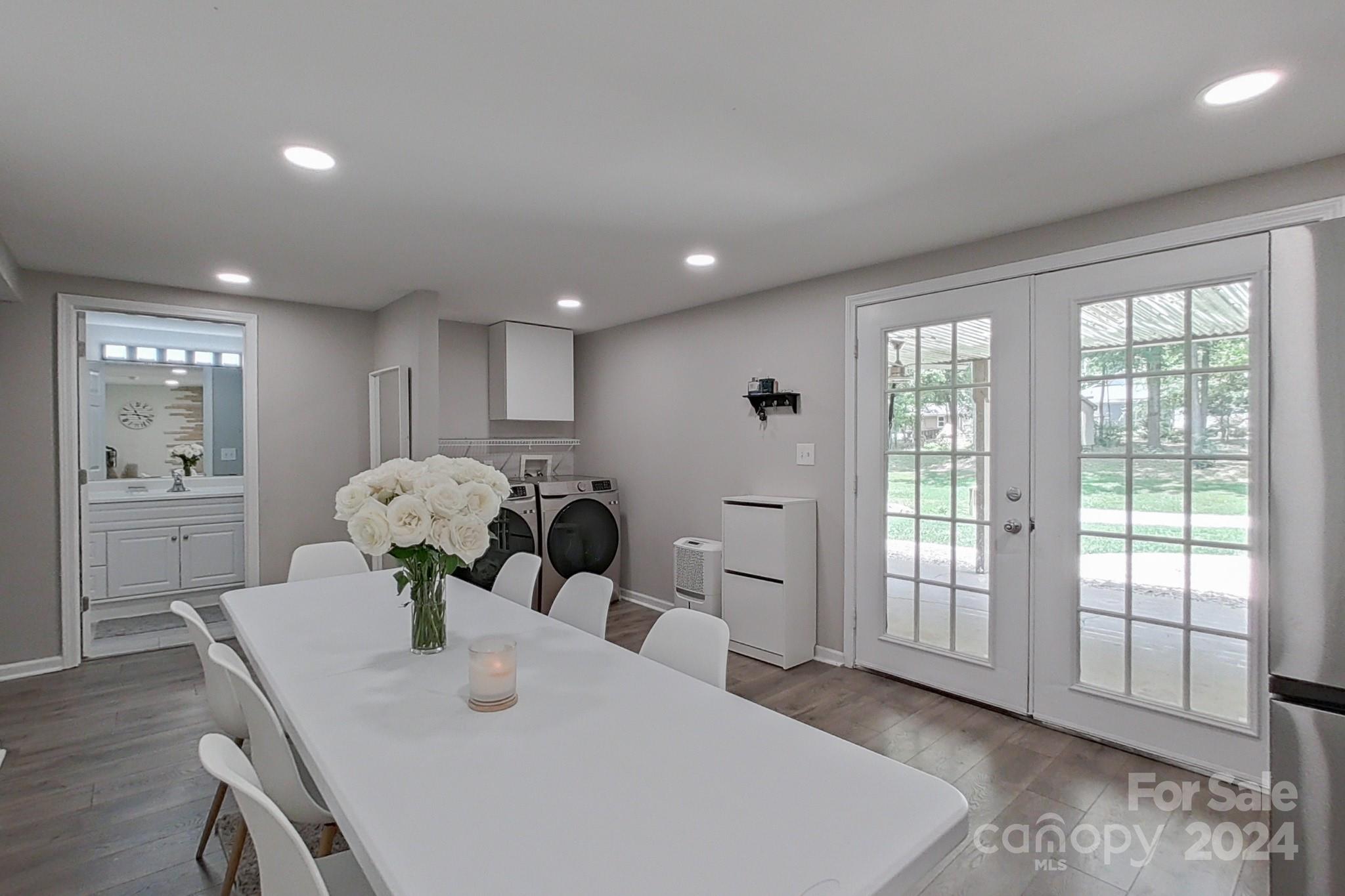 202 Smith Street Locust, NC 28097 - Photo 29 of 42 a view of a dining room with furniture and window