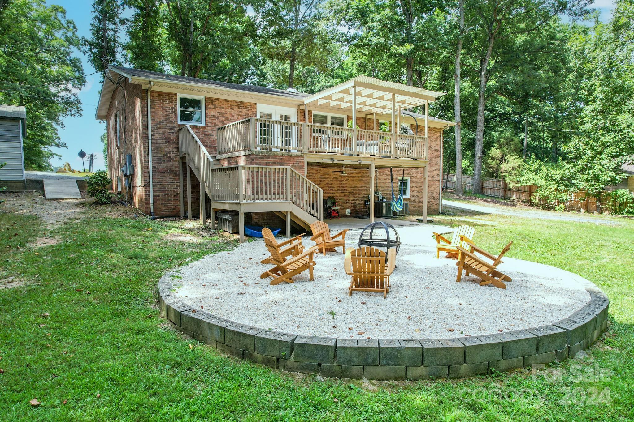 202 Smith Street Locust, NC 28097 - Photo 38 of 42 a front view of a house with a garden