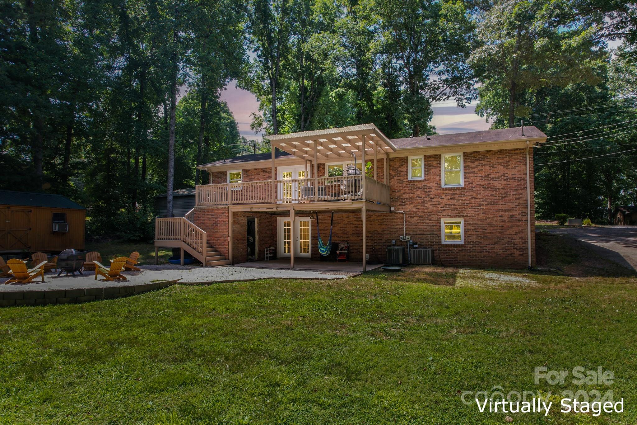 202 Smith Street Locust, NC 28097 - Photo 42 of 42 a front view of a house with a yard and trees