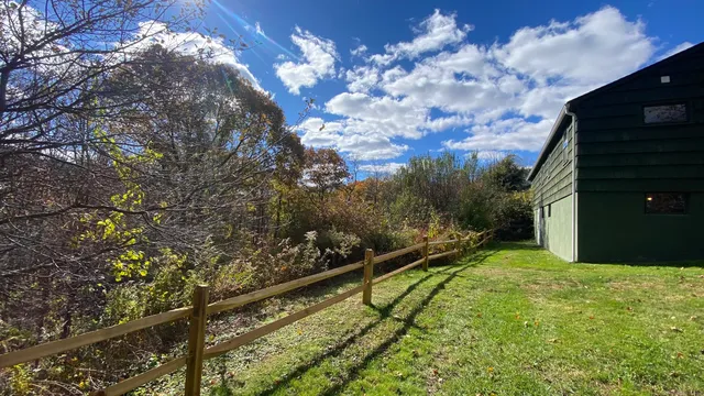 a view of an outdoor space and a yard