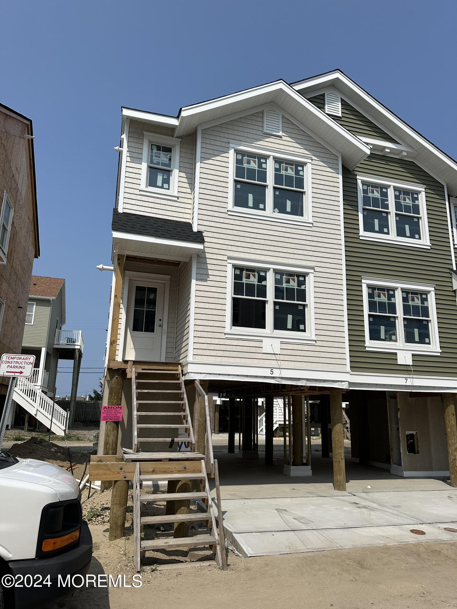 5 Shell Road Mantoloking, NJ 08738 - Photo 1 of 10 a front view of a house with stairs