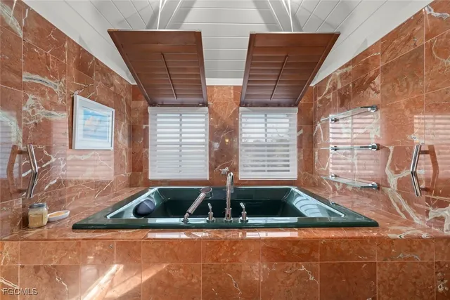 a view of hallway with wooden floor