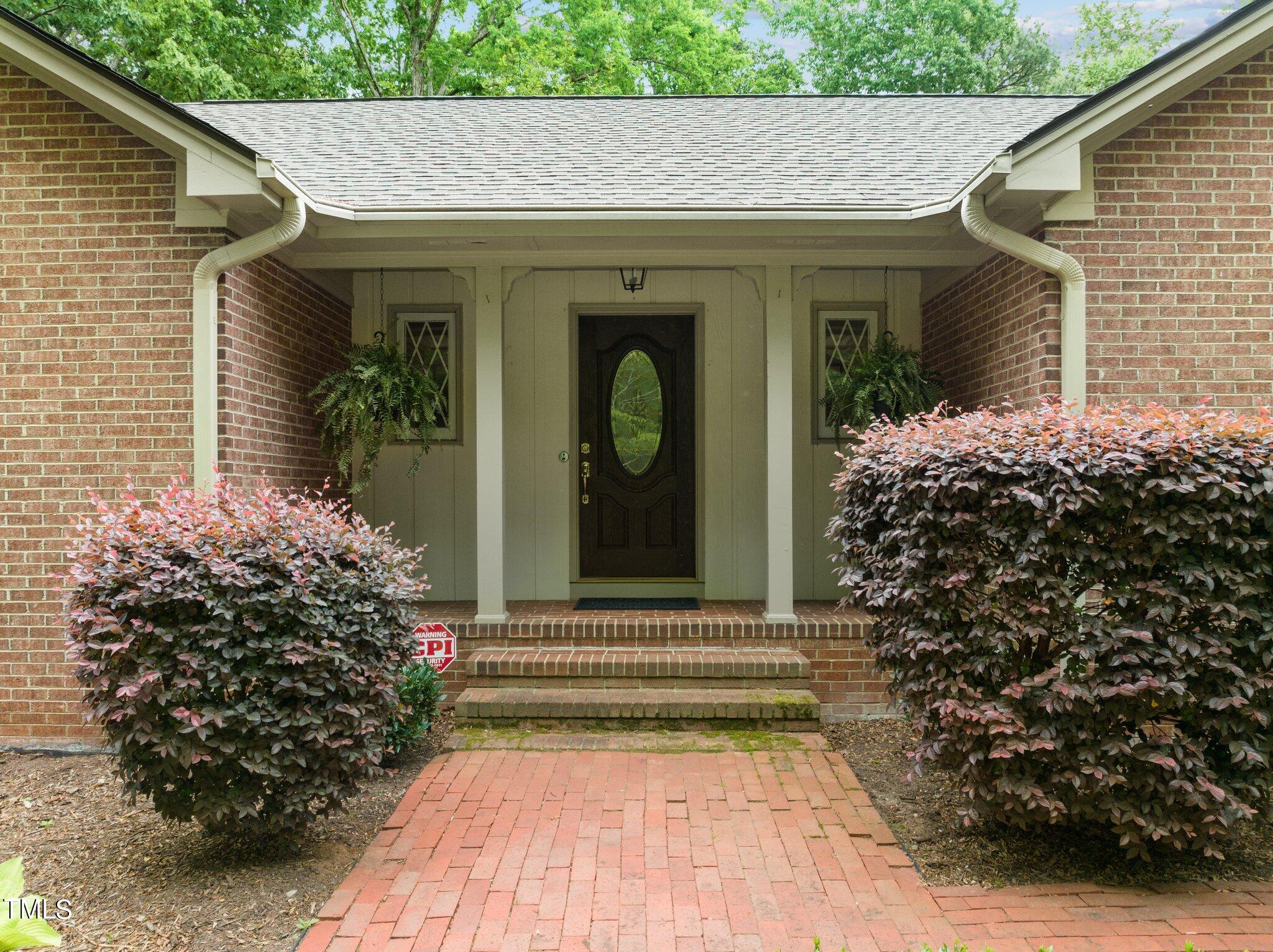 7908 Netherlands Drive Raleigh, NC 27606 - Photo 3 of 60 7-web-or-mls-DJI_0198