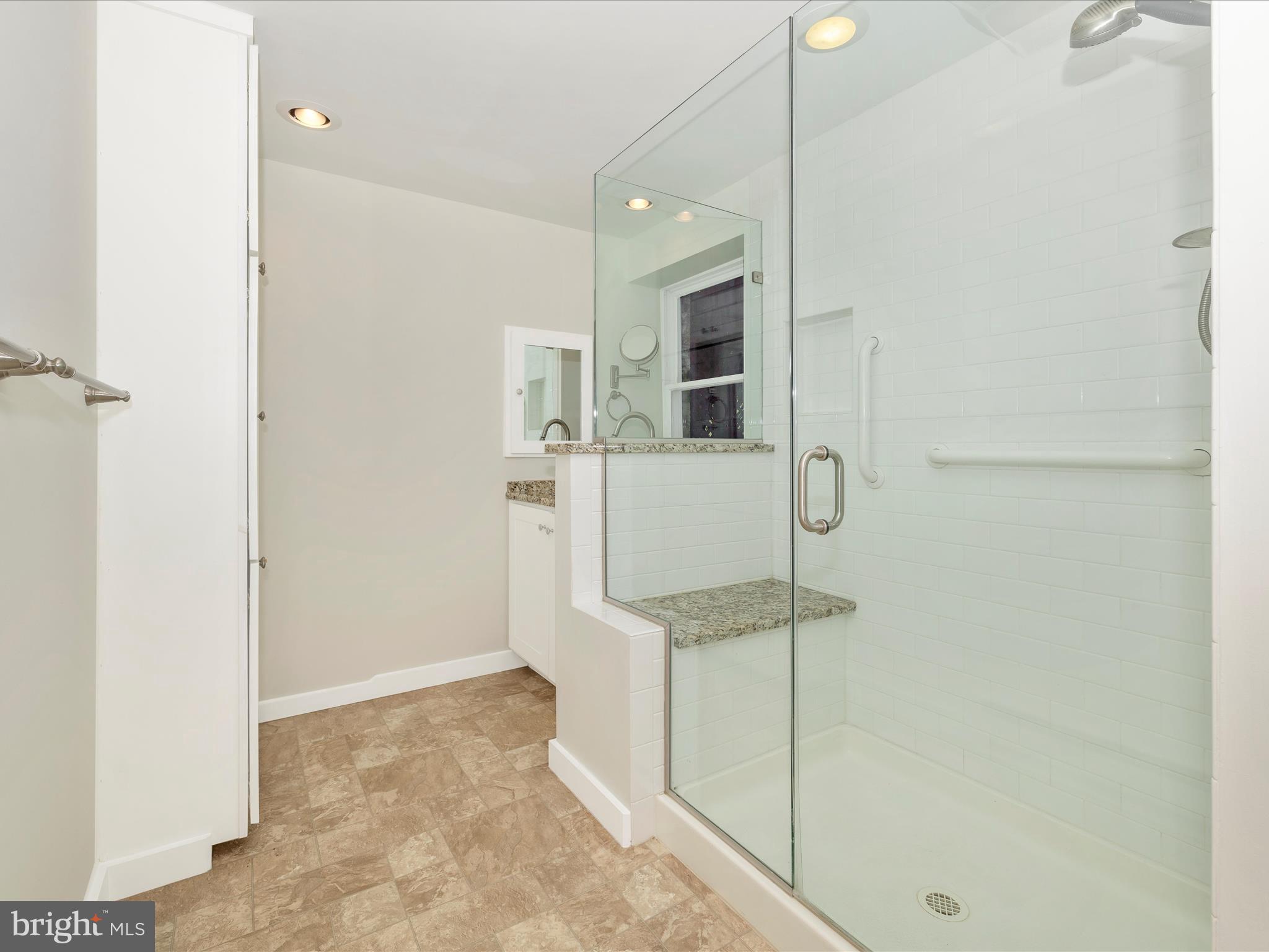 12436 Legore Road Keymar, MD 21757 - Photo 50 of 72 a bathroom with a shower and a sink