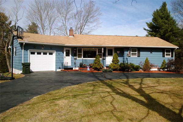 89 Sutton Road Webster, MA 01570 - Photo 1 of 1 a front view of a house with garden