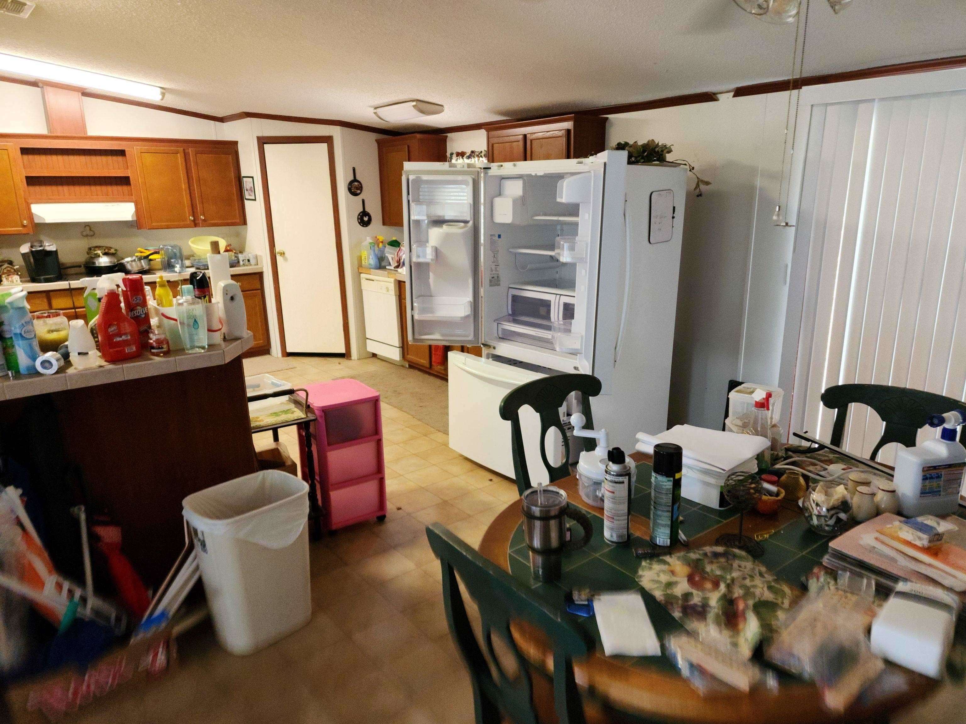 8431 Walden Road Jacksonville, FL 32244 - Photo 17 of 29 a dining room with furniture and a floor to ceiling window