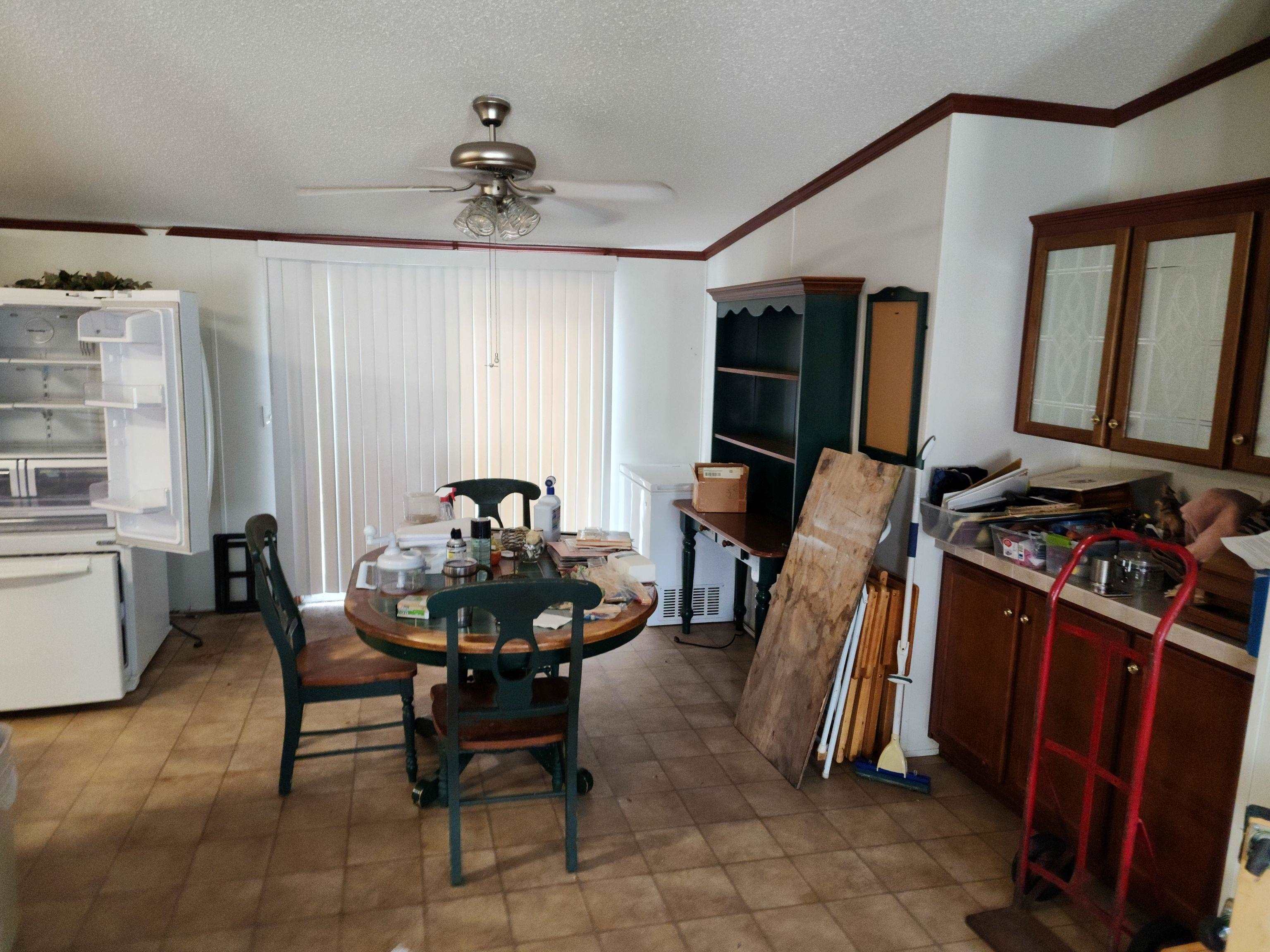 8431 Walden Road Jacksonville, FL 32244 - Photo 18 of 29 a dining room with furniture and window