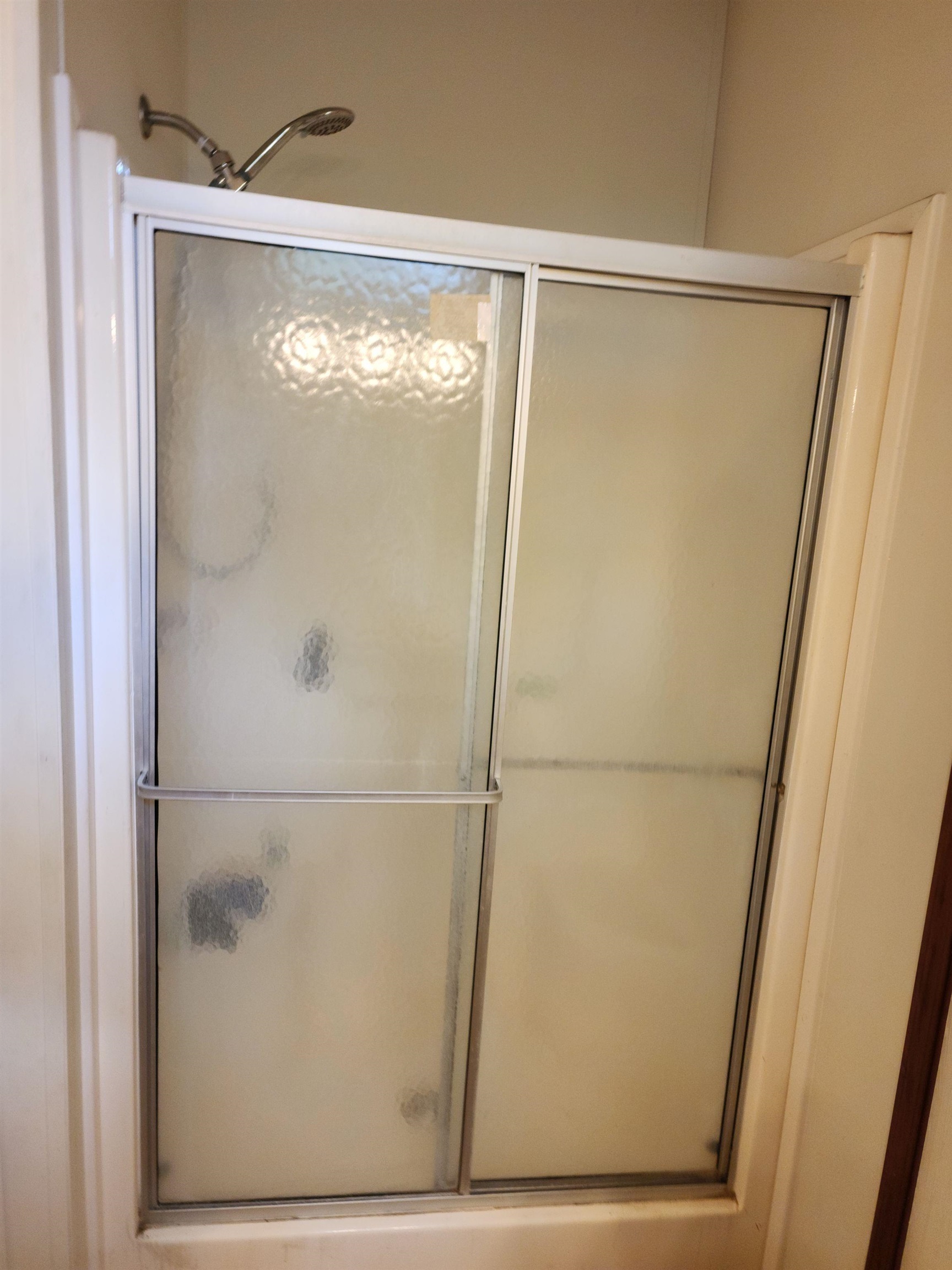 8431 Walden Road Jacksonville, FL 32244 - Photo 21 of 29 a bathroom with a glass shower door