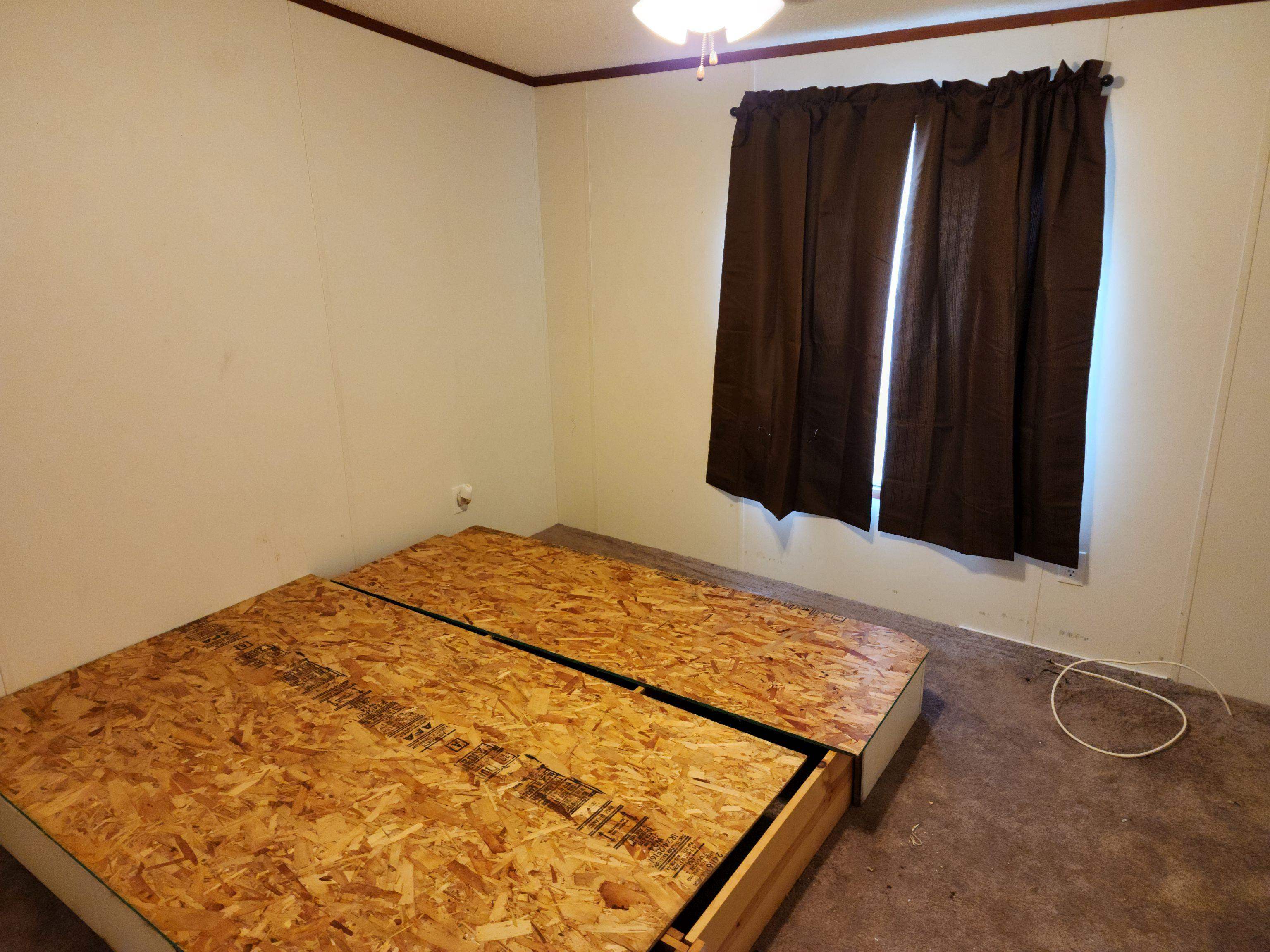 8431 Walden Road Jacksonville, FL 32244 - Photo 23 of 29 a view of a room with wooden floor