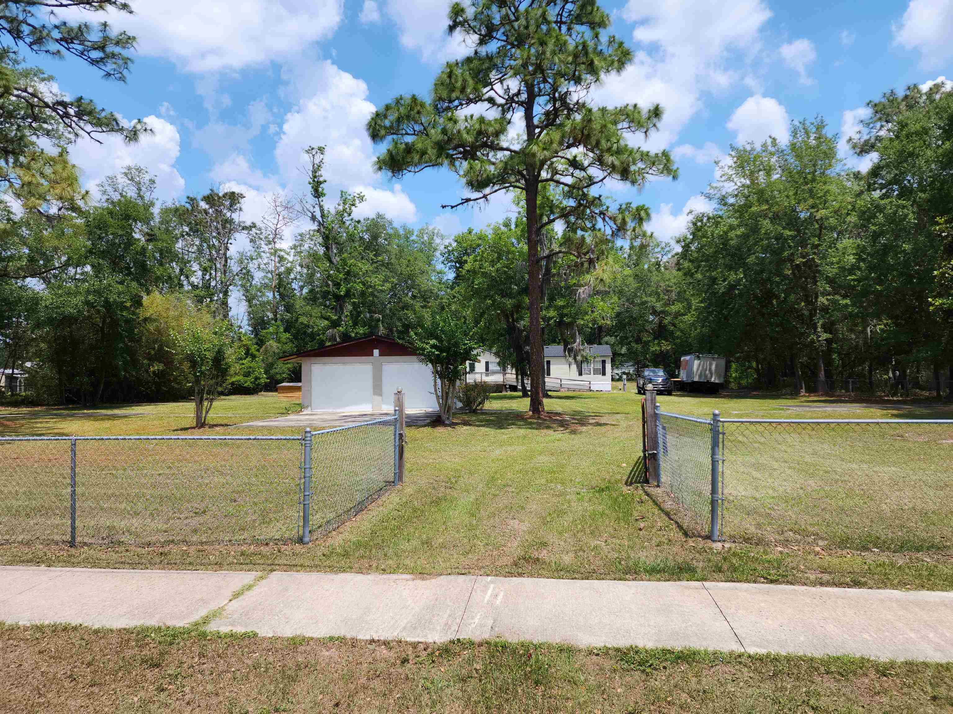 8431 Walden Road Jacksonville, FL 32244 - Photo 4 of 29 a view of a park with large trees