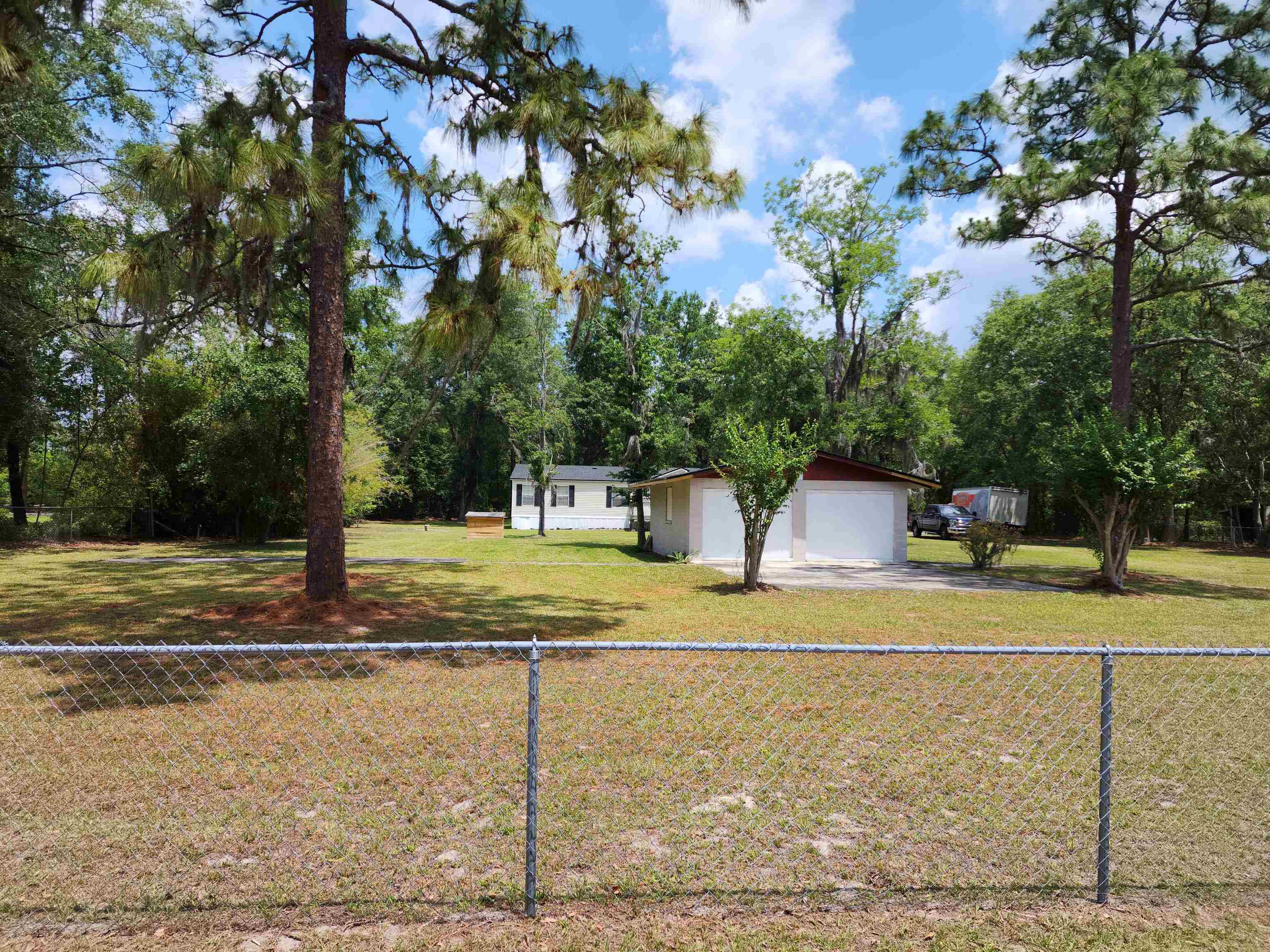 8431 Walden Road Jacksonville, FL 32244 - Photo 5 of 29 a view of a house with a yard