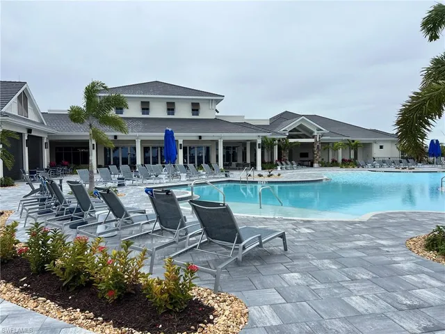 a front view of a house with a lake view