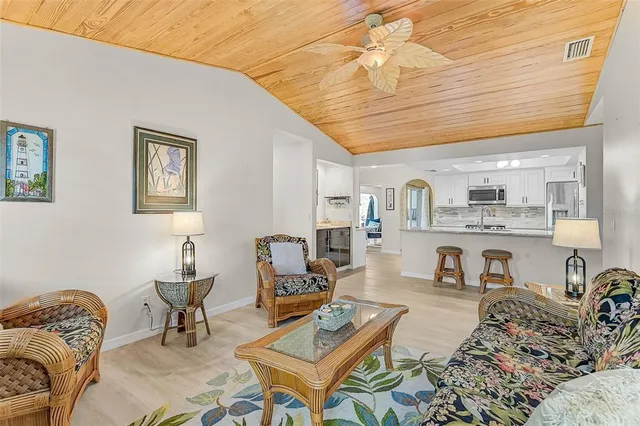 a living room with furniture and a table