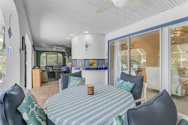 a view of a livingroom with furniture and a window