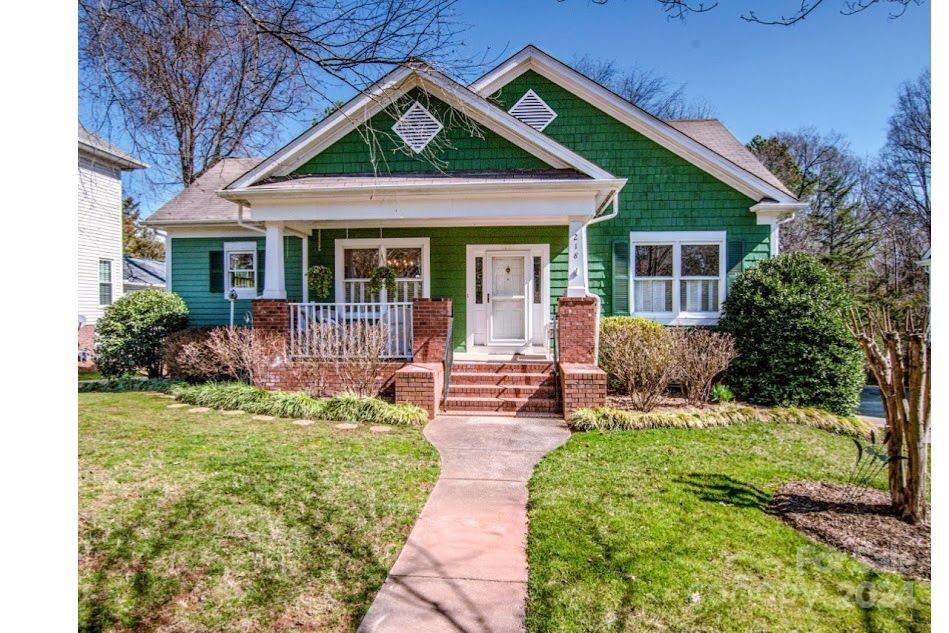 218 North Kimberly Road Davidson, NC 28036 - Photo 1 of 44 a view of a house with garden and porch
