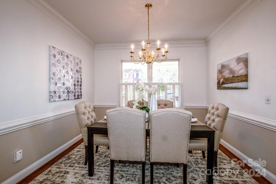 218 North Kimberly Road Davidson, NC 28036 - Photo 13 of 44 a view of a dining room with furniture window and outside view