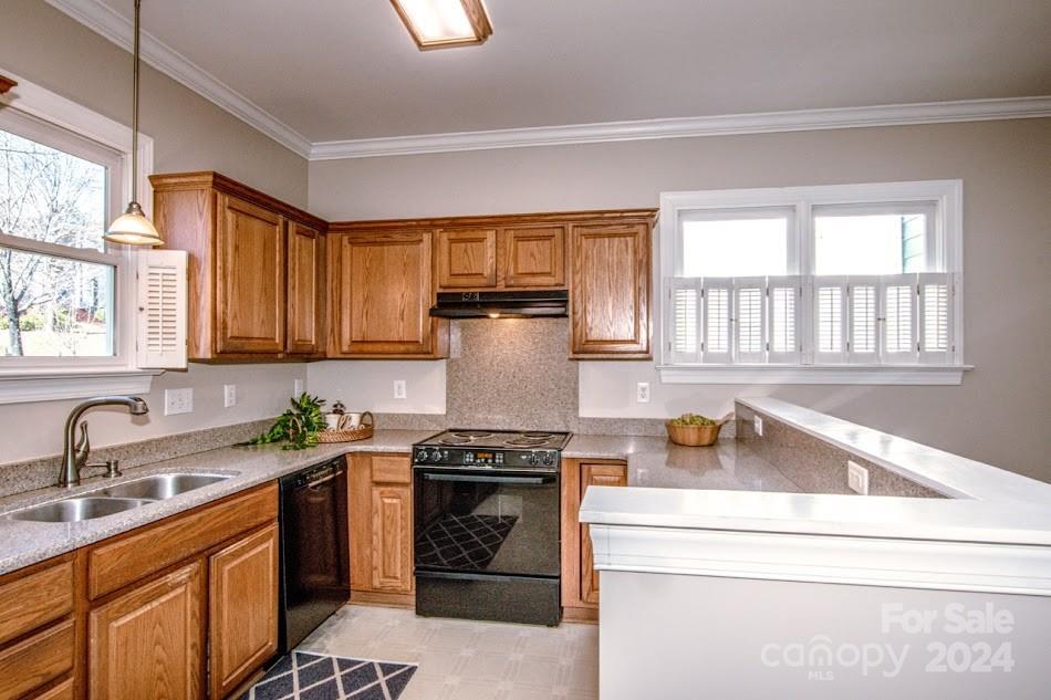 218 North Kimberly Road Davidson, NC 28036 - Photo 17 of 44 a kitchen with stainless steel appliances granite countertop a sink stove and refrigerator