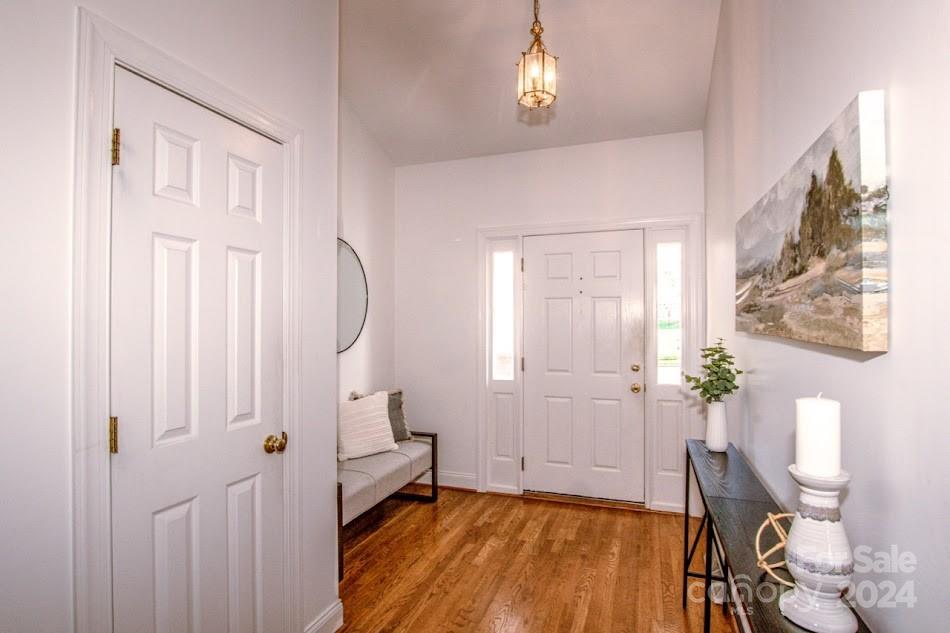 218 North Kimberly Road Davidson, NC 28036 - Photo 5 of 44 a view of an entryway with wooden floor