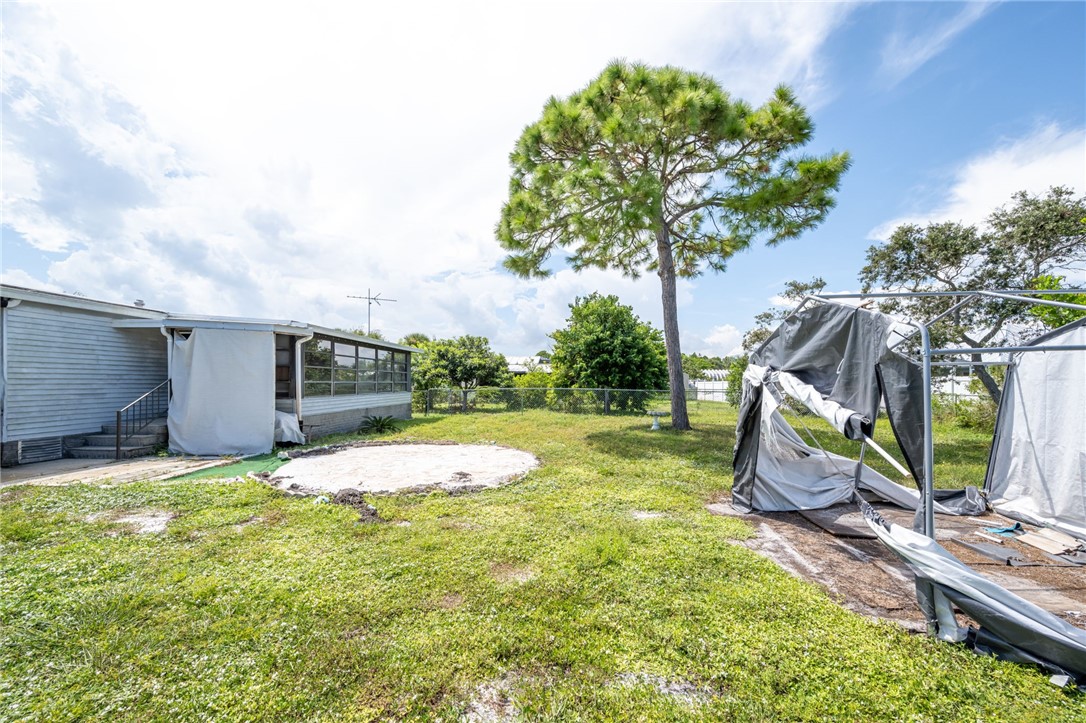 3836 13th Street Micco, FL 32976 - Photo 26 of 35 a view of a backyard with swimming pool