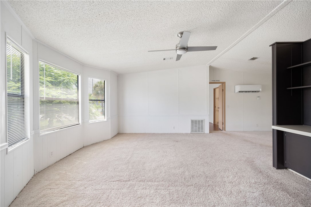 3836 13th Street Micco, FL 32976 - Photo 3 of 35 an empty room with windows and closet