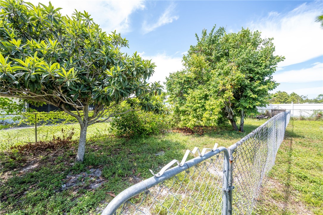 3836 13th Street Micco, FL 32976 - Photo 31 of 35 a view of a wooden bridge